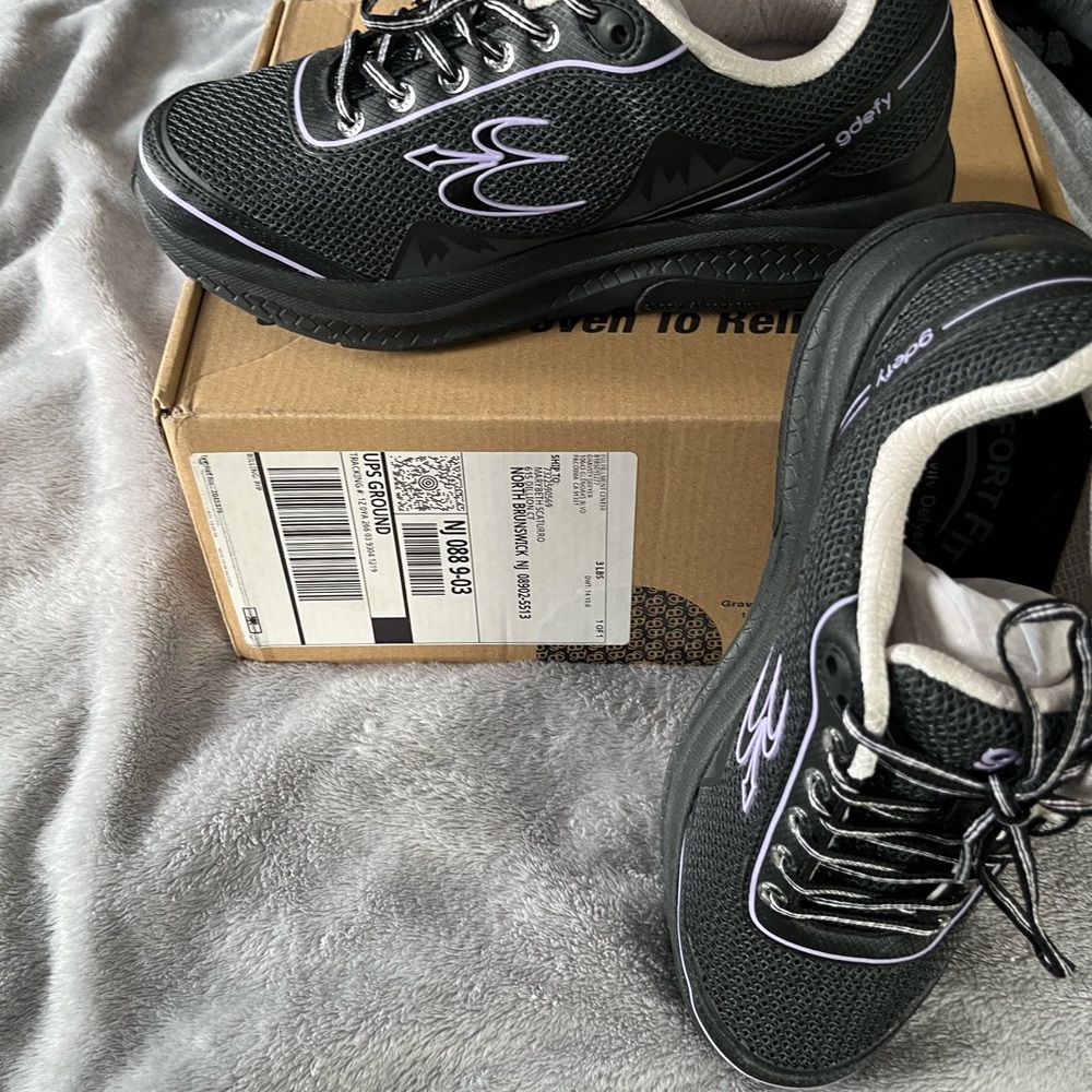 Woman’s defy sneakers